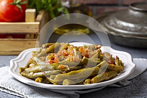 Traditional delicious Turkish food Green beans with olive oil Turkish name Zeytinyagli taze fasulye photo