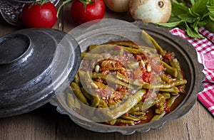 Traditional delicious Turkish food Green beans with olive oil Turkish name Zeytinyagli taze fasulye photo