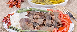 Traditional delicious Turkish foods; Doner kebab and rice pilav photo