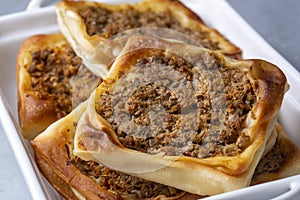 Traditional delicious Turkish foods; Kaytaz pastry with minced meat of Turkey Hatay - Antakya region Turkish name; Kaytaz boregi