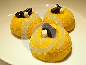 Traditional dessert of Bergamo: sweetened polenta and chocolate birds