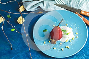 Traditional dessert pears stewed in red wine with wine sauce