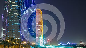 Traditional dhow boat in Doha at night timelapse, with modern buildings in the background.