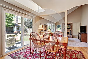 Traditional dining area. Open floor plan. Connected to living room.