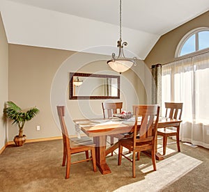 Traditional dinning room with carpet, in beautiful northwest home.