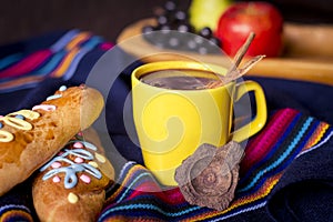 Traditional dish and drink Ecuador, called: Colada Morada and bread guaguas