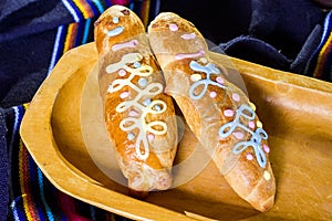 Traditional dish and drink Ecuador, called: Colada Morada and bread guaguas