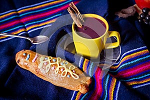 Traditional dish and drink Ecuador, called: Colada Morada and bread guaguas