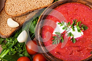 A traditional dish of Russian and Ukrainian cuisine - borsch. Soup from young beets, cabbage and potatoes. Served with