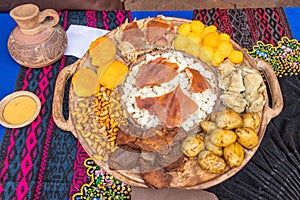 Traditional dishes of Ecuadorian highlands: mote, hornado, fritada photo