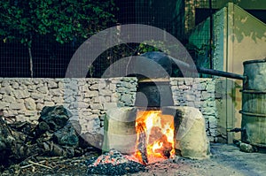 Traditional distillation of raki in Crete
