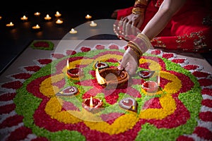 Traditional diya lamps lit during diwali celebration