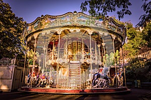 Traditional double decker carousel fairground ride in Montmartre, Paris, France