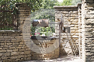 Traditional draw well in the street of a village