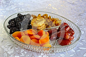 Traditional dried fruits in a glass tray. Jewish holiday Tu Bishvat, Israel