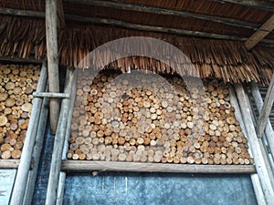 Traditional dry wood pile texture in the equatorial garden of Pontianak, West Kalimantan, Indonesia