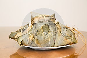 Traditional Duanwu Chinese rice dumplings stacked on plate