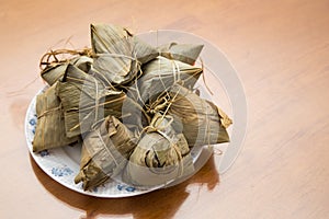 Traditional Duanwu Chinese rice dumplings stacked on plate