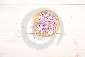 Traditional Dutch birth celebration biscuit with pink muisjes