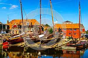Traditional Dutch Botter Fishing Boats on the Dry Dock in the Harbor of the historic village of Spakenburg-Bunschoten