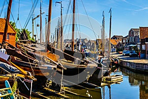 Traditional Dutch Botter Fishing Boats on the Dry Dock in the Harbor of the historic village of Spakenburg-Bunschoten