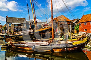 Traditional Dutch Botter Fishing Boats on the Dry Dock in the Harbor of the historic village of Spakenburg-Bunschoten