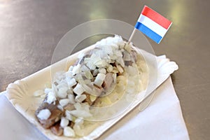 Traditional dutch food: herring fish in fastfood market of Amsterdam, Netherlands