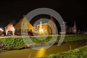 Traditional Dutch Houses at Night in Oostkapelle, Zeeland, Netherlands photo