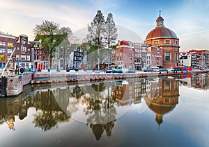 Traditional Dutch old houses on canals in Amsterdam