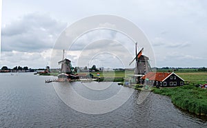 Traditional Dutch old wooden windmill in Zaanse Schans - museum