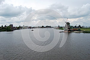 Traditional Dutch old wooden windmill in Zaanse Schans - museum