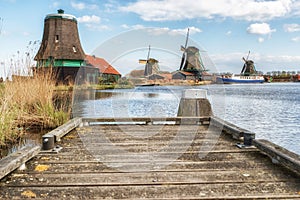 Traditional Dutch old wooden windmill in Zaanse Schans - museum