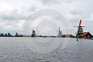 Traditional Dutch old wooden windmill in Zaanse Schans - museum