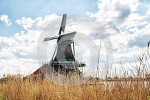 Traditional Dutch old wooden Windmills in Zaanse Schans - museum