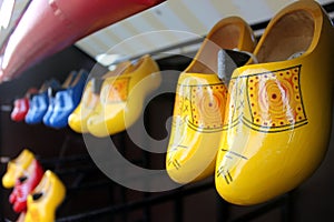 Traditional dutch shoes mounted on wooden wall