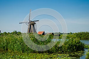 Traditional dutch windmill in famous Kinderdijk, The Netherlands