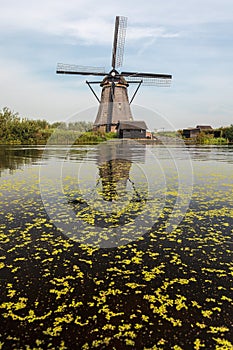 A traditional Dutch windmill in Kinderdijk Holland