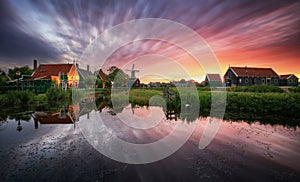 Traditional dutch windmill near the canal. Netherlands, Landcape