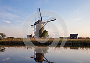 Traditional dutch windmill in village Kinderdijk, Holland