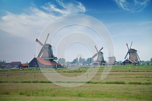 Traditional Dutch windmills with canal near the Amsterdam