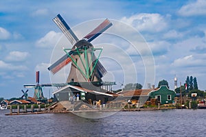 traditional Dutch Windmills and cottages in Zaanse Schans, Netherland