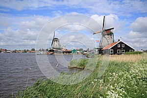 Traditional Dutch windmills at Zaanse Schans closed to Amsterdam