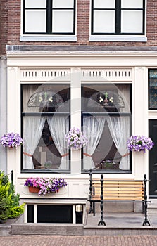 Traditional dutch windows with flowers