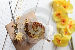 A traditional Easter cake and festive decoration on a white wooden surface