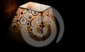 Traditional electric lamp shades at night