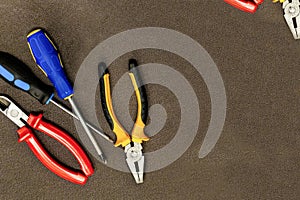 Traditional electrician tool a pair of nippers screwdrivers copy space design engineering background