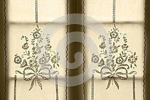 Traditional embroidered window curtain with floral pattern. Azor