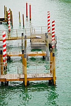 Traditional empty pier on Venice canal