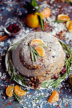 Traditional English Christmas plum pudding, sugar icing