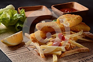 Traditional English Food - Fish and Chips. Fried fish filets and crispy French fries